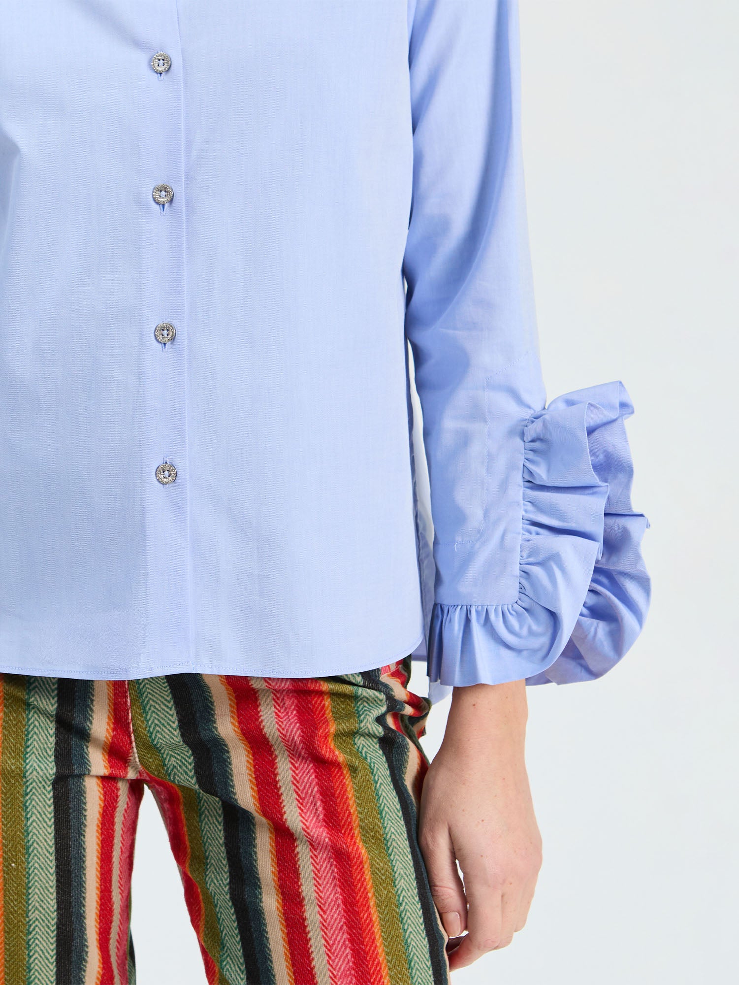 BLUE SHIRT WITH SIDE RUFFLES