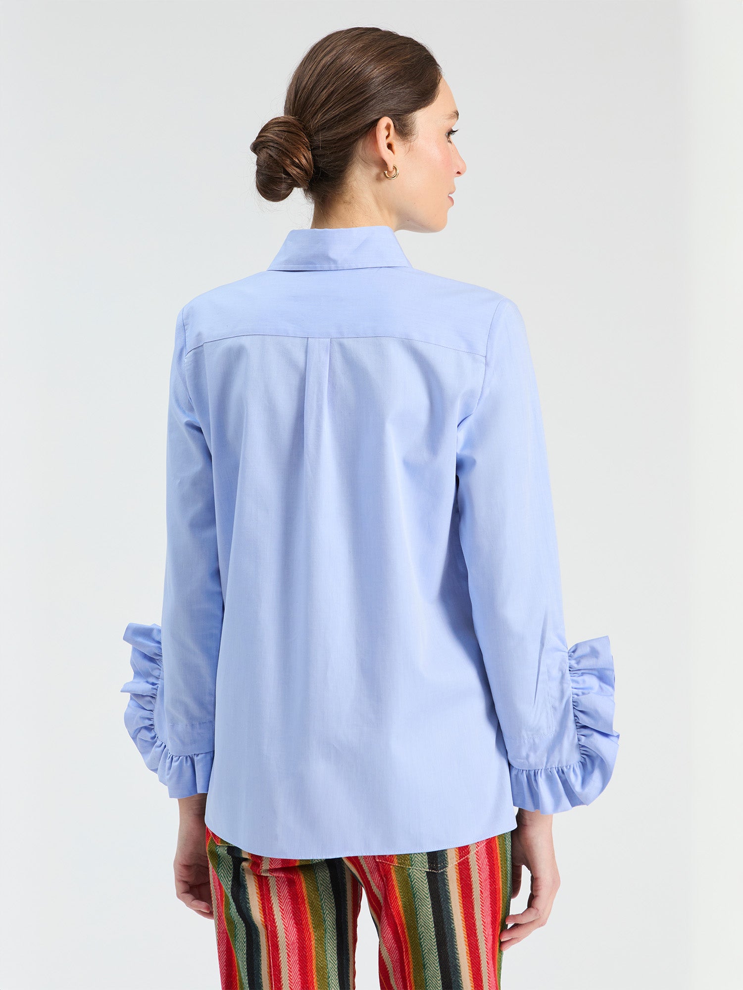 BLUE SHIRT WITH SIDE RUFFLES