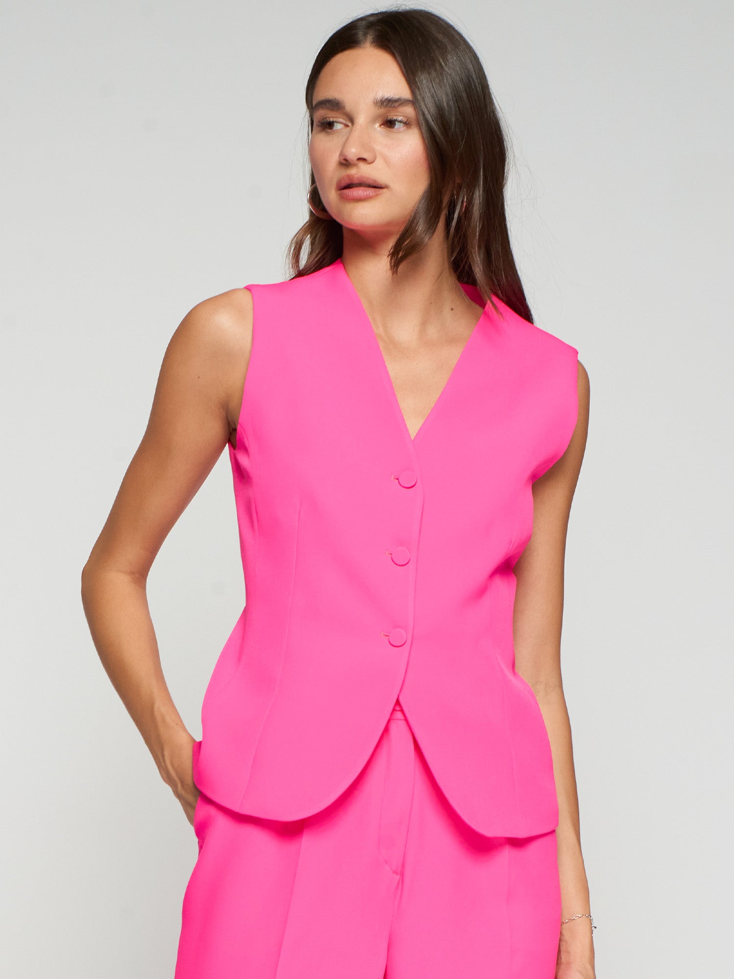 CHALECO FUCSIA TEJIDO LISO