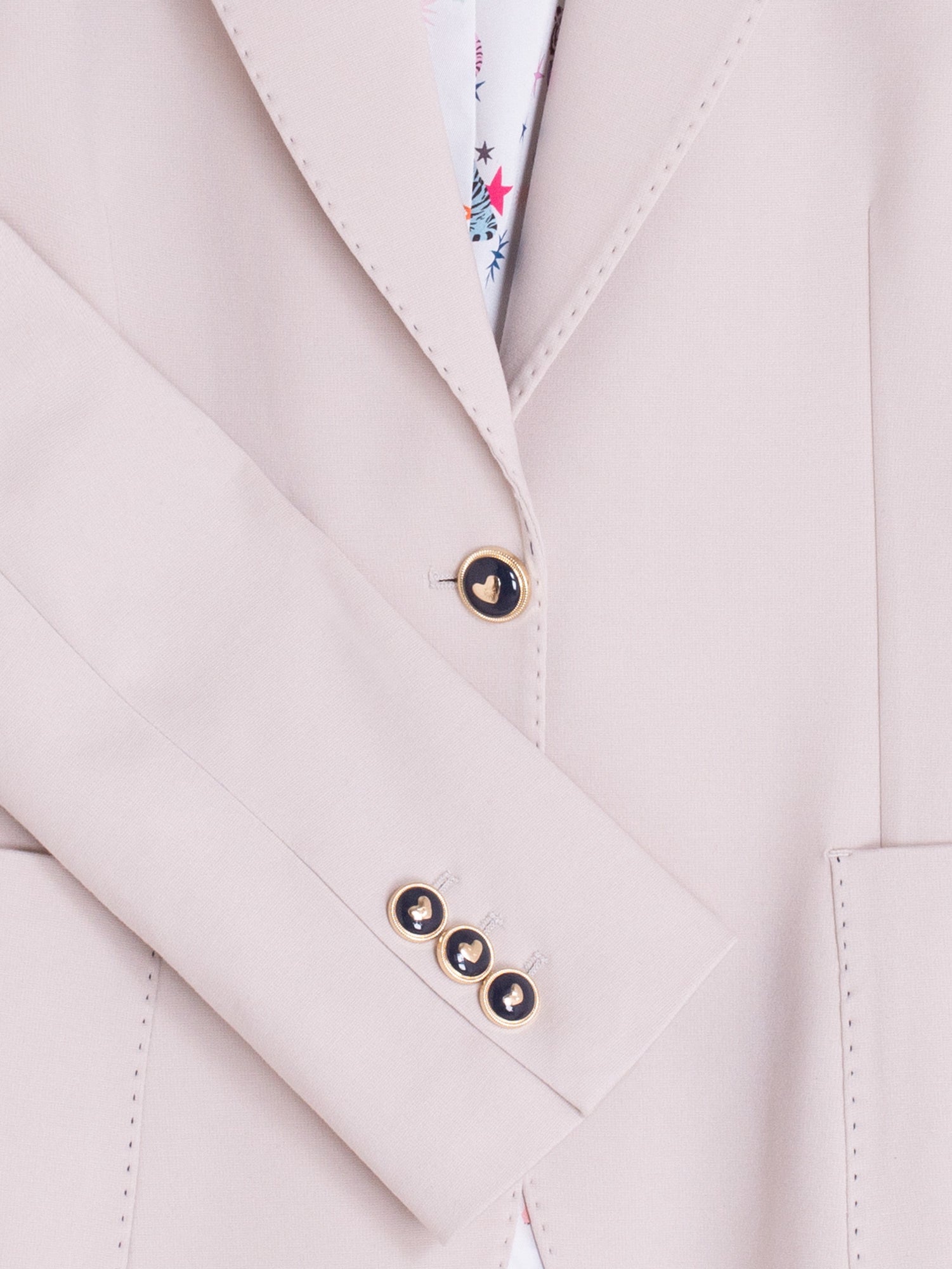 CHAQUETA BEIGE FORRO ILUSTRADO